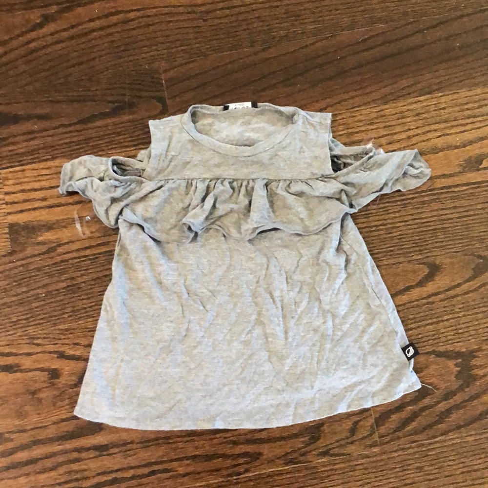 Off the shoulder T-shirt.